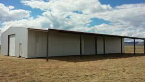 49x100 fully enclosed with 20 foot lean-to in New Mexico